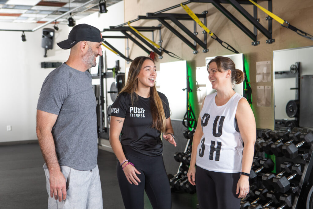 PUSH Fitness coach and members
